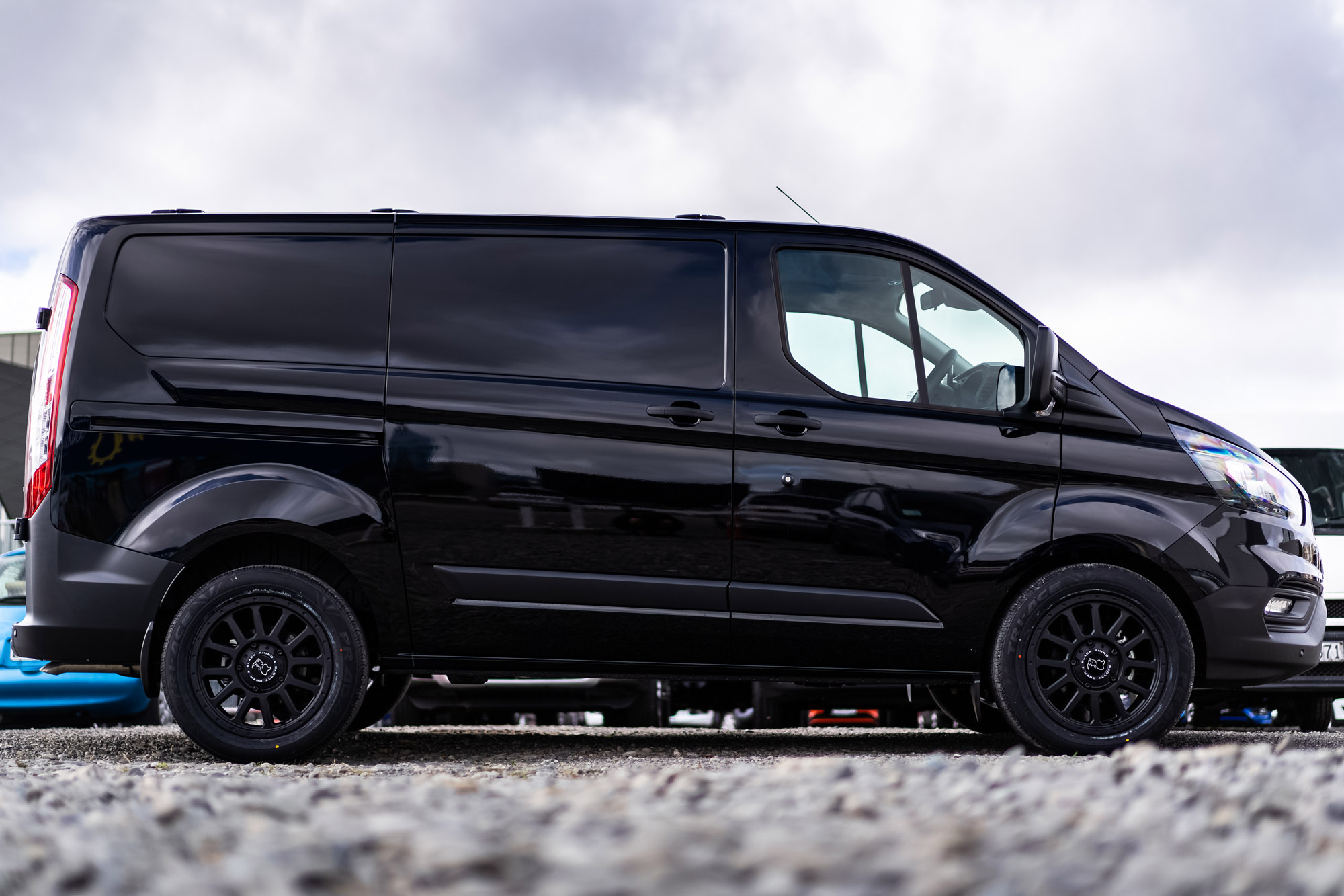 Black Ford Transit Custom on Black Rhino Havasu commercial passenger van matte black wheels - 80